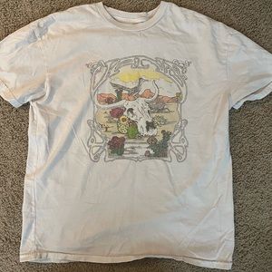 Vans: beige western rustic oversized t shirt in a size small